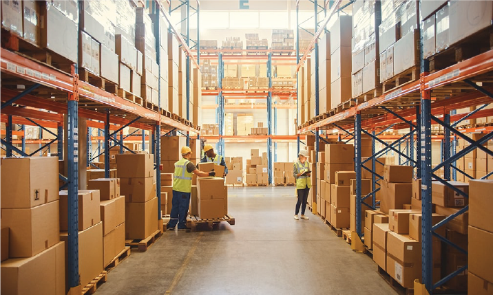 a group of people in a warehouse